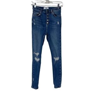 We The Free High Waisted Button Fly Distressed Jeans